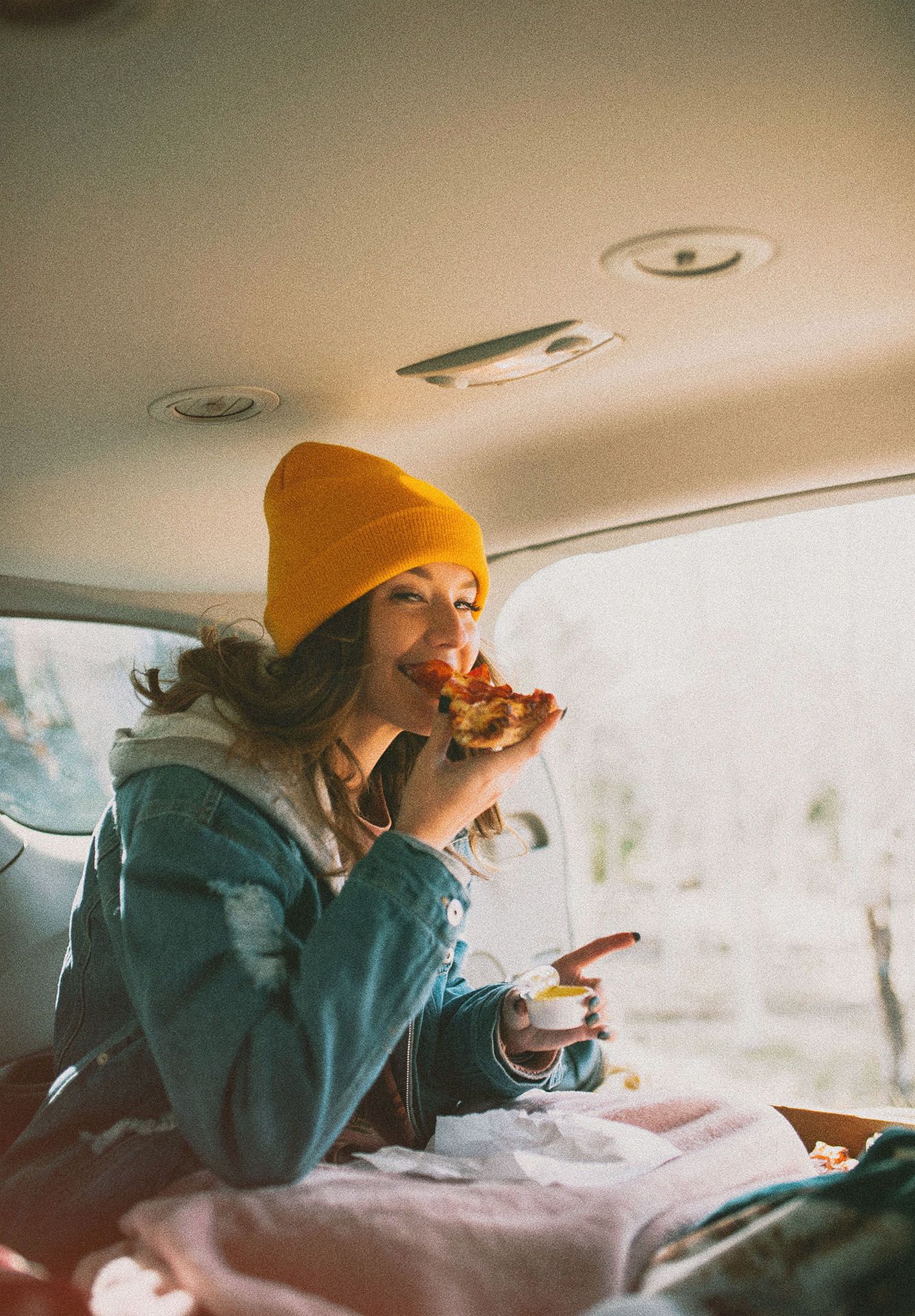 Girl eating pizza