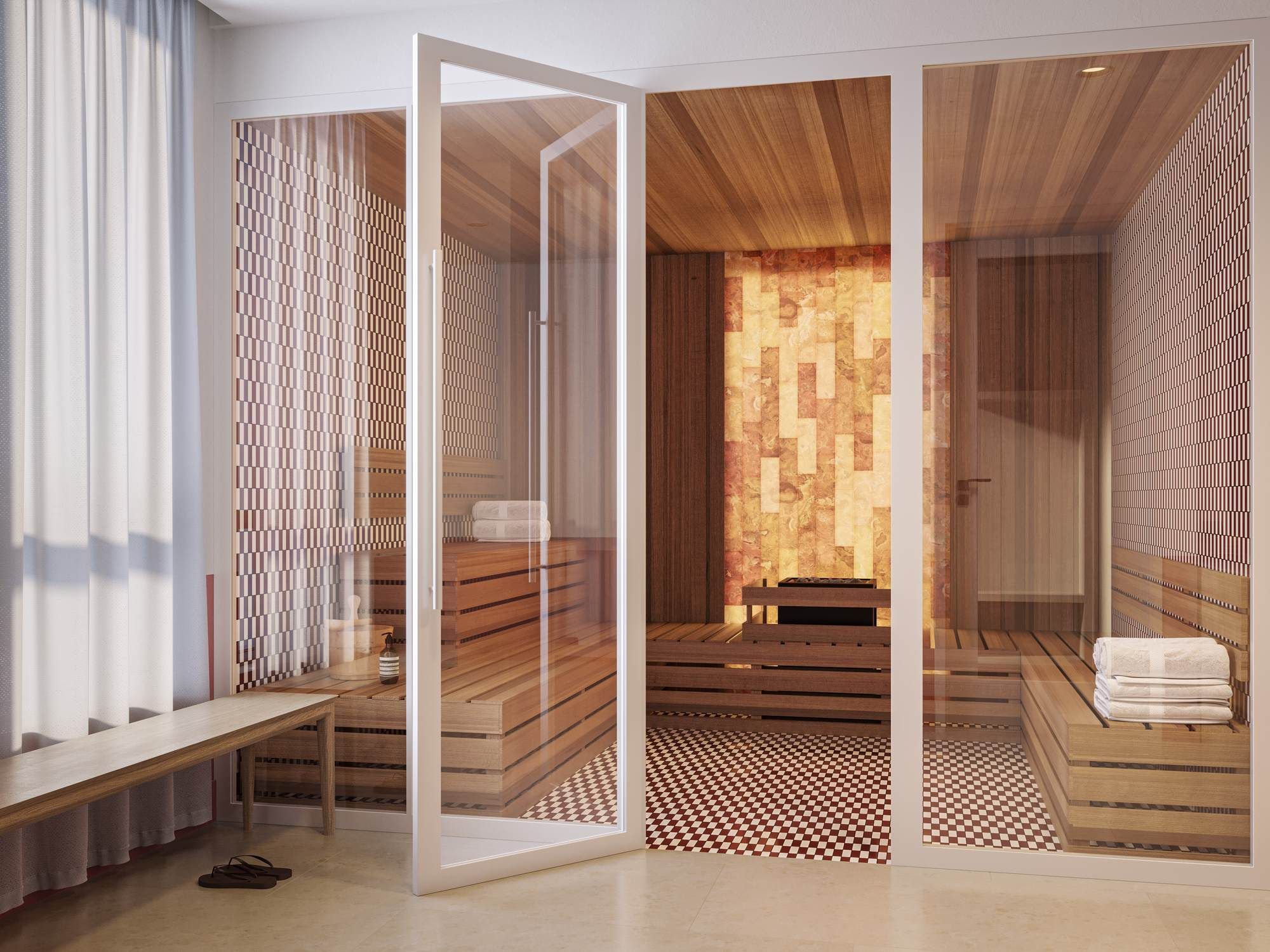 Modern sauna at VERVE Tempe featuring wood-paneled walls, built-in bench seating, and a glass door entry with soft ambient lighting.