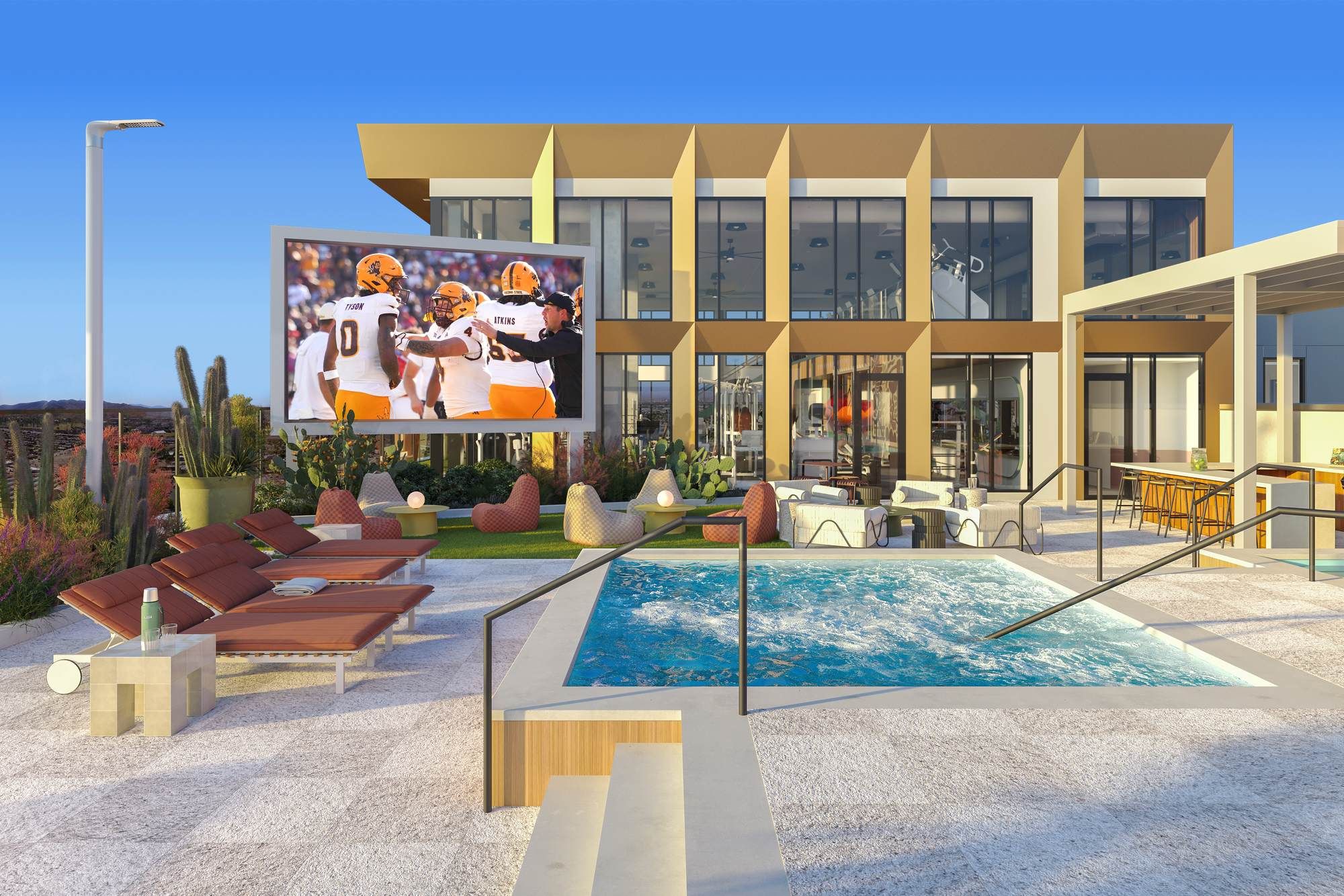 Outdoor pool area at VERVE Tempe with a large screen for entertainment, modern lounge seating, and a stylish, contemporary design.